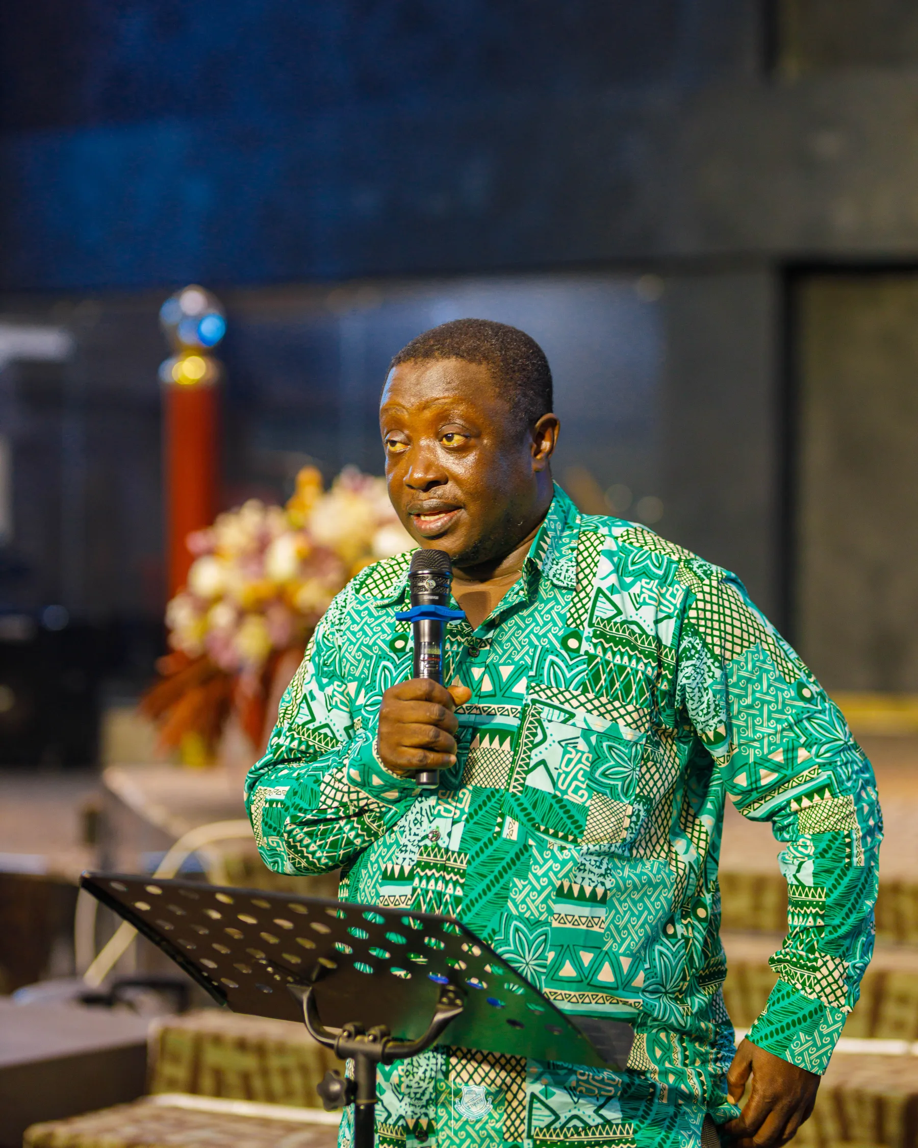 An older guest speaking at the O’Reilly leavers thanksgiving service